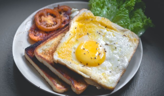 bread slices and half fried egg