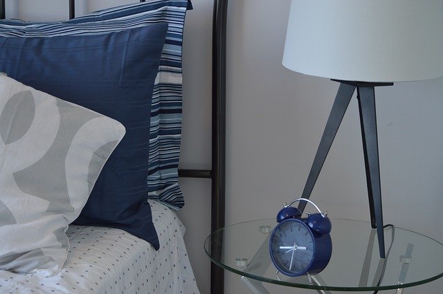 alarm clock close to bed Tips on how to not snooze your alarm